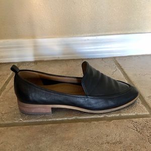 Black loafers with brown sole